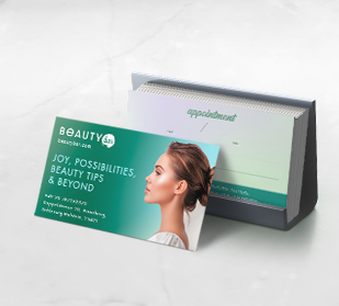 front of business card and back of business cards on table