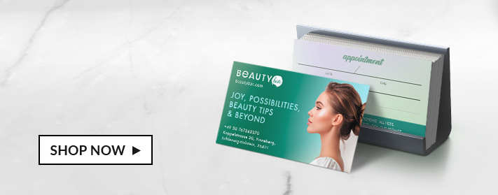 front of business card and back of business cards on table